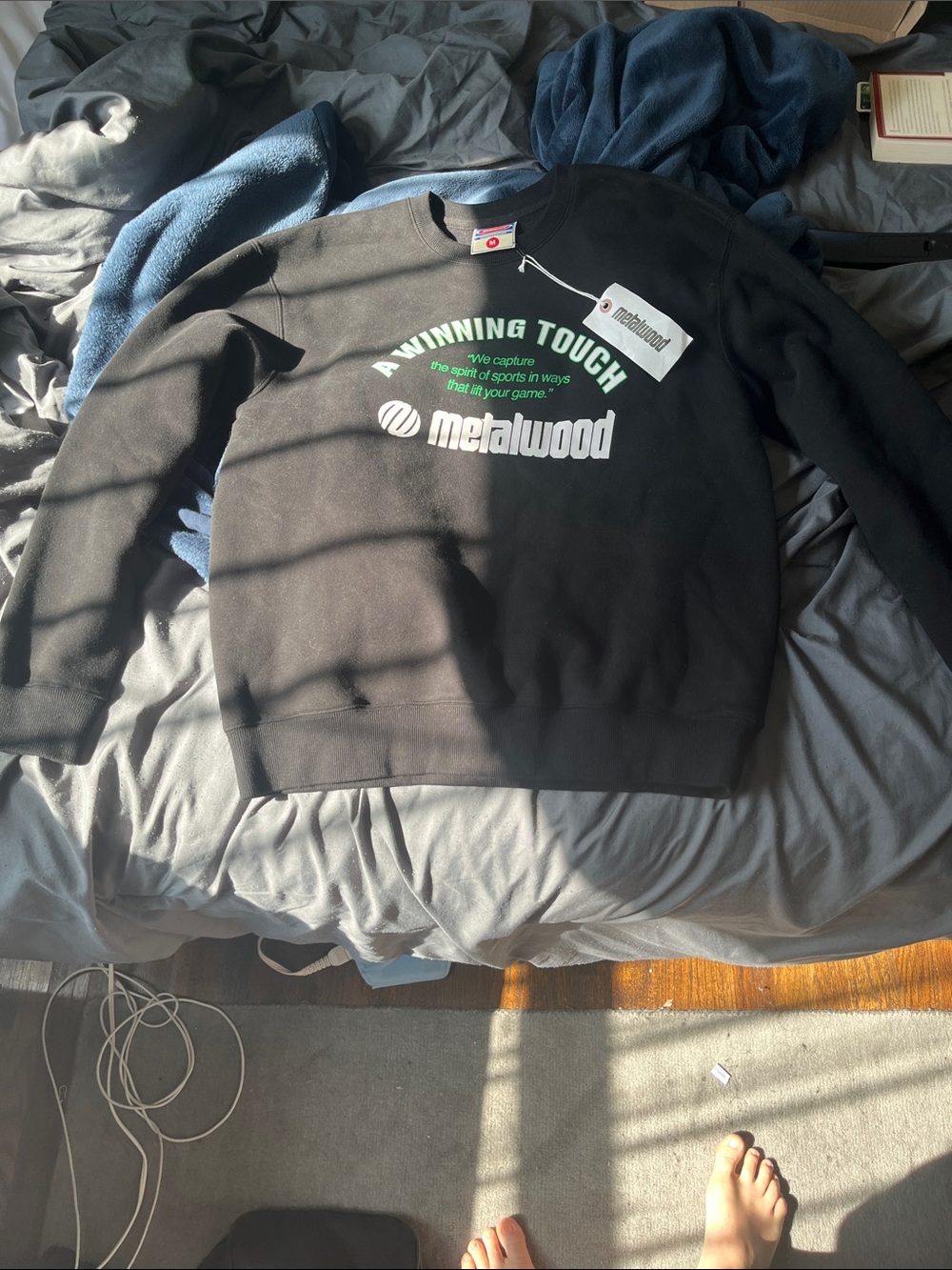 Men's Black Crewneck Sweater with Green Chest Graphic